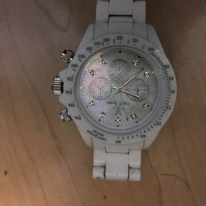 White toy watch with diamonds